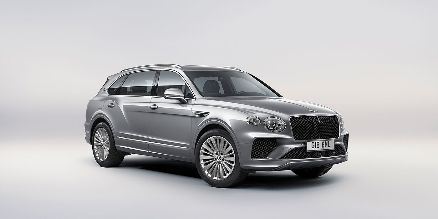 Bentley Leeds Bentley Bentayga Extended Wheelbase luxury SUV front three quarter view in Moonbeam paint with 21 inch five spoke painted wheels