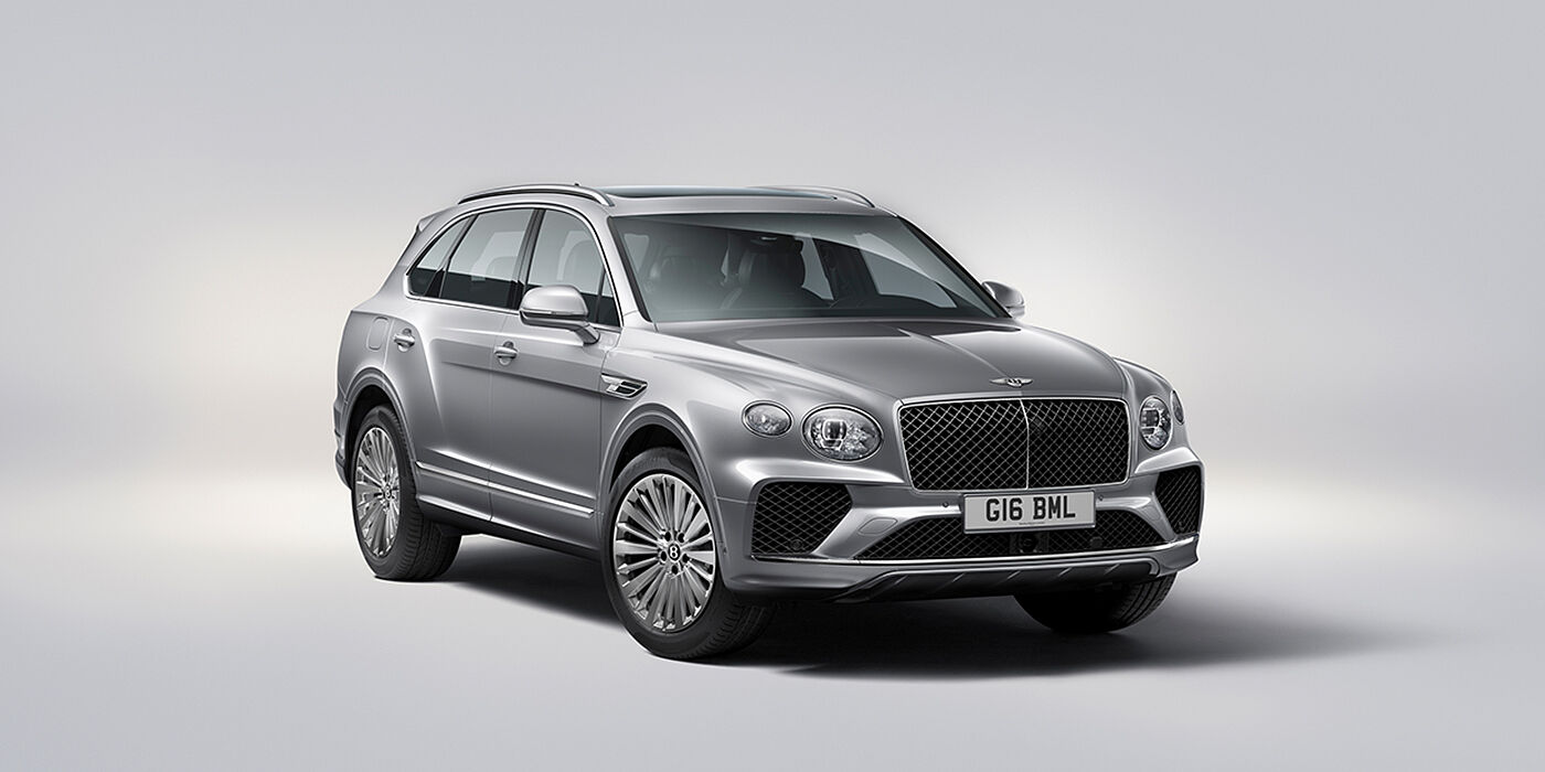 Bentley Leeds Bentley Bentayga luxury SUV front three quarter view in Moonbeam paint with matrix grille and 21″ 5 spoke painted wheels