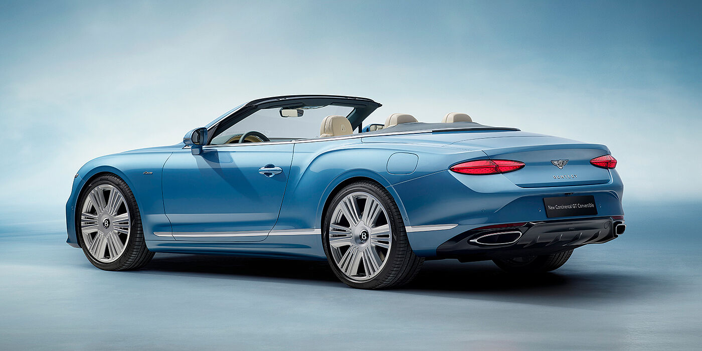 Bentley Leeds New Bentley Continental GTC Azure convertible rear view in Light Windsor blue paint with 22 inch ten spoke wheels and chrome exterior details