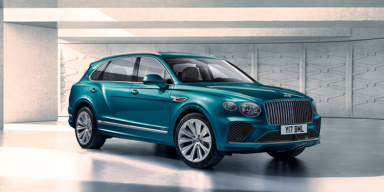 Bentley Leeds Bentley Bentayga Extended Wheelbase Azure SUV front three quarter in Topaz blue paint colour with a grey background