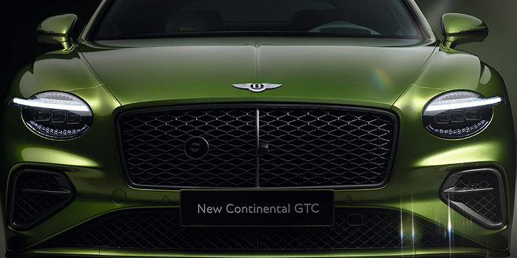 Bentley Leeds Bentley Continental GTC Speed convertible front bonnet detail in Tourmaline Green paint showing new light design