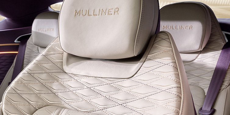 Bentley Leeds Bentley Continental GT Mulliner coupe seat detail in Linen leather with Mulliner Diamond in Diamond quilting and Mulliner embroidered seat emblem